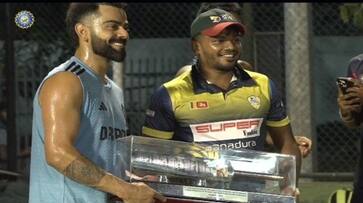 Sri Lankan Cricketers Present Virat Kohli Silver Bat at Colombo during practice session rsk Sri Lankan Cricketers Present Virat Kohli Silver Bat at Colombo during practice session rsk