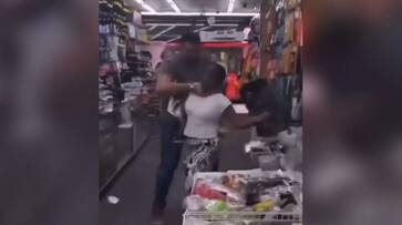 Shocking London shopkeeper grabs woman by throat after altercation; controversial video goes viral - WATCH Shocking London shopkeeper grabs woman by throat after altercation; controversial video goes viral - WATCH