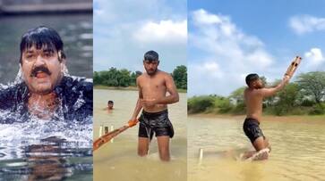 Young Boys Play Cricket In A Lake gkc Young Boys Play Cricket In A Lake gkc
