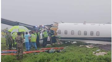 Flight skids and crashes in the runway while landing in heavy rain afe Flight skids and crashes in the runway while landing in heavy rain afe