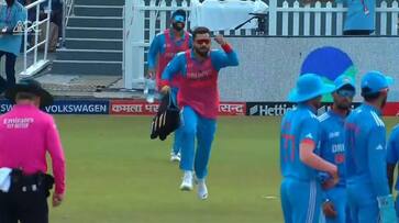 Watch Virat Kohli carrying drinks after Bangladesh's 3rd wicket fall in Asia Cup Super 4s match gkc Watch Virat Kohli carrying drinks after Bangladesh's 3rd wicket fall in Asia Cup Super 4s match gkc