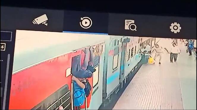 crpf officer rescues a woman passenger who fell down from running train in coimbatore railway station vel