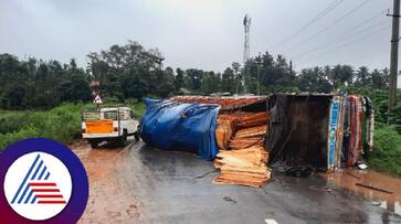 10 wheeler lorry overturned on the national highway resulting in a traffic jam for some time at chikkamagaluru rav 10 wheeler lorry overturned on the national highway resulting in a traffic jam for some time at chikkamagaluru rav