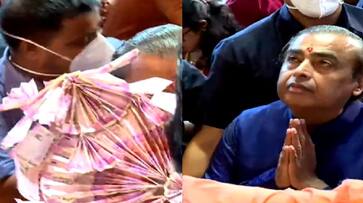 Mukesh Ambani Offers Garland Made 2,000 Notes At Lalbaugcha Raja apk Mukesh Ambani Offers Garland Made 2,000 Notes At Lalbaugcha Raja apk