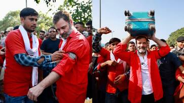 Rahul Gandhi wears porter uniform at Delhi railway station SSM Rahul Gandhi wears porter uniform at Delhi railway station SSM