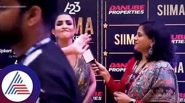 Lakshmi Manchu hits a man for blocking her interview at SIIMA 2023 suc Lakshmi Manchu hits a man for blocking her interview at SIIMA 2023 suc