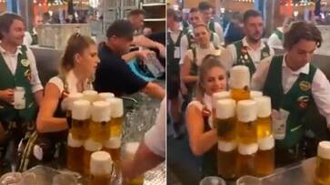 waitress carries 13 beer mugs at a time going viral hyp waitress carries 13 beer mugs at a time going viral hyp
