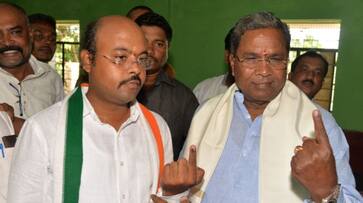 BJP Lodges Plaint With EC Against Siddaramaiah, Son For Distributing Goodies To Voters BJP Lodges Plaint With EC Against Siddaramaiah, Son For Distributing Goodies To Voters
