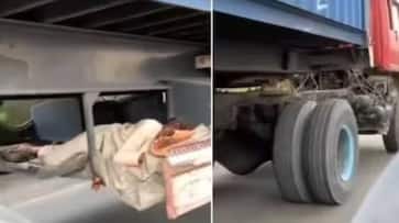 man sleeping under moving truck rlp man sleeping under moving truck rlp