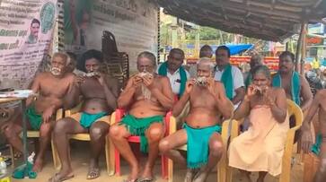 Cauvery dispute Tamil Nadu farmers protest with a dead rat in their mouths rav Cauvery dispute Tamil Nadu farmers protest with a dead rat in their mouths rav