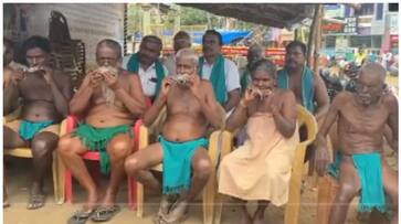Farmers protest in Tamil Nadu by biting dead rats on Kaveri River Water Dispute bkg Farmers protest in Tamil Nadu by biting dead rats on Kaveri River Water Dispute bkg