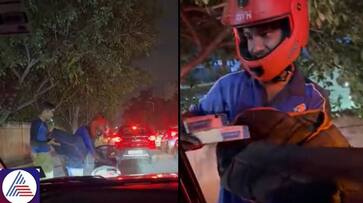 Domino's delivery hero: Agents go extra mile to deliver pizza in Bengaluru traffic chaos, video trends - WATCH vkp Domino's delivery hero: Agents go extra mile to deliver pizza in Bengaluru traffic chaos, video trends - WATCH vkp