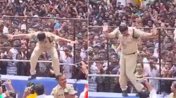 WATCH Hyderabad cops' dance alongside devotees during Ganesh Visarjan goes viral snt WATCH Hyderabad cops' dance alongside devotees during Ganesh Visarjan goes viral snt