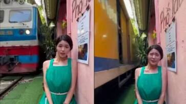 woman standing very near to moving train viral video from Hanoi Train Street rlp woman standing very near to moving train viral video from Hanoi Train Street rlp