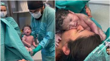 mother seeing her child for the first time after delivery hyp mother seeing her child for the first time after delivery hyp