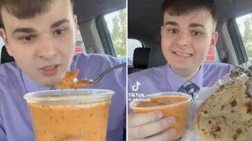 US man trying butter chicken and naan first time rlp US man trying butter chicken and naan first time rlp