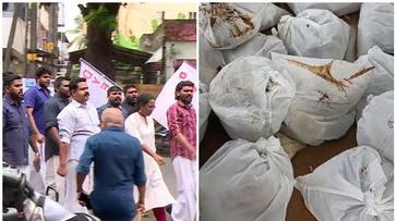 Allegation that food kit for poor people was not distribution DYFI protest nbu Allegation that food kit for poor people was not distribution DYFI protest nbu