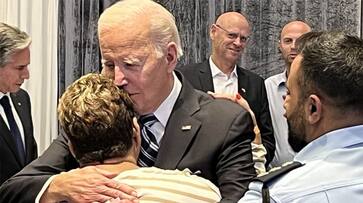 Viral photo Joe Biden hugs Israeli woman who tricked Hamas operatives with cookies coffee gcw Viral photo Joe Biden hugs Israeli woman who tricked Hamas operatives with cookies coffee gcw