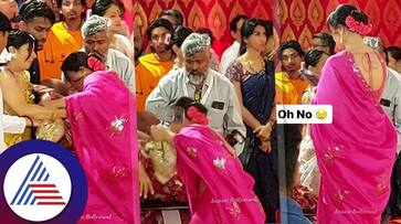 Kajol falls at Durga puja pandal; son Yug comes to her rescue suc Kajol falls at Durga puja pandal; son Yug comes to her rescue suc