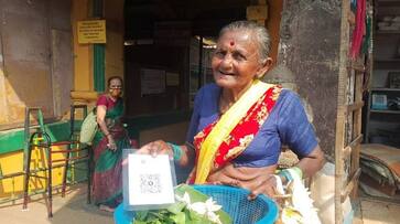 Flowers Seller Old Age Woman Have Phonepay at Gokarna in Uttara Kannada grg Flowers Seller Old Age Woman Have Phonepay at Gokarna in Uttara Kannada grg