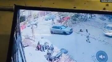 Man Deliberately drives car over stray dog Ghaziabad video captured in CCTV ckm Man Deliberately drives car over stray dog Ghaziabad video captured in CCTV ckm