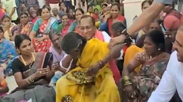 telangana minister malla reddy makes elderly woman sit on his lap in bizarre incident ash telangana minister malla reddy makes elderly woman sit on his lap in bizarre incident ash
