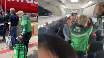 Grab Delivery Rider Fly from Thailand to Singapore to get Chicken rice customer in thailand ans Grab Delivery Rider Fly from Thailand to Singapore to get Chicken rice customer in thailand ans