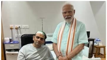 pm modi visits gujarat chief minister s son anuj patel who suffered brain stroke in april ash pm modi visits gujarat chief minister s son anuj patel who suffered brain stroke in april ash