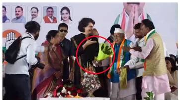 Congress worker gives flowerless bokeh to Priyanka Gandhi fvv Congress worker gives flowerless bokeh to Priyanka Gandhi fvv