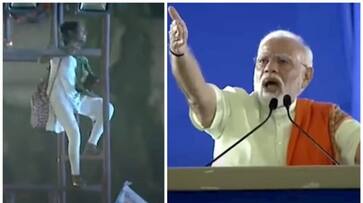 girl climbed on to a light tower while pm narendra modi speaking in telangana kms girl climbed on to a light tower while pm narendra modi speaking in telangana kms