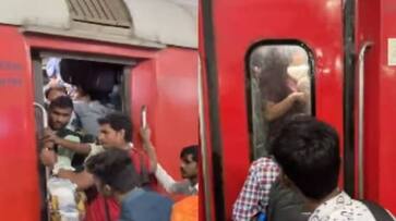 indian railway man with confirmed ac ticket barred from boarding because of overcrowding rlp indian railway man with confirmed ac ticket barred from boarding because of overcrowding rlp