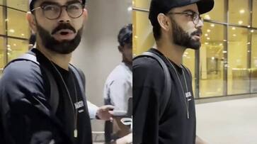 Virat kohli request fans to not take photo near daughter in Mumbai Airport vide goes viral ckm Virat kohli request fans to not take photo near daughter in Mumbai Airport vide goes viral ckm