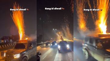 video of Diwali celebration with firecrackers on top of a running car has gone viral bkg video of Diwali celebration with firecrackers on top of a running car has gone viral bkg