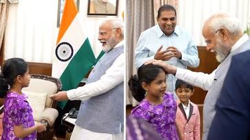 PM Modi charms children, shows coin trick in candid interaction (WATCH) AJR PM Modi charms children, shows coin trick in candid interaction (WATCH) AJR