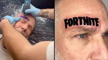 man losing bet to son tattooed Fortnite on forehead rlp man losing bet to son tattooed Fortnite on forehead rlp