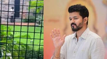Actor Thalapathy Vijay chilling with pet dog in his house video went viral in internet ans Actor Thalapathy Vijay chilling with pet dog in his house video went viral in internet ans