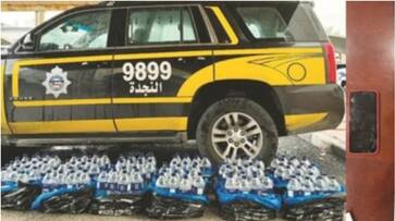 126 Liquor Bottles and cash seized in kuwait 126 Liquor Bottles and cash seized in kuwait