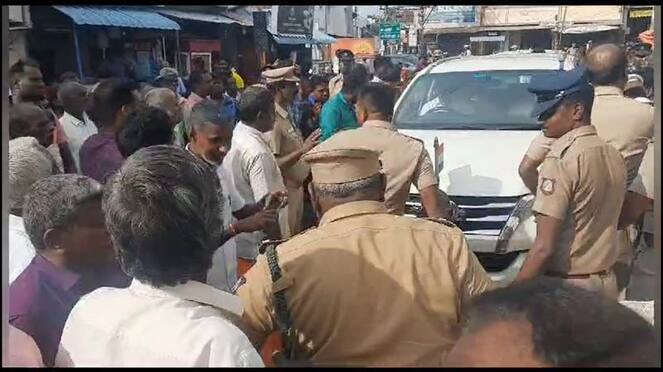 aiadmk person blocks minister kn nehru car in thuraiyur vel