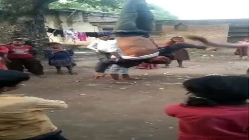 young man hanged from tree and brutally beaten in mirzapur uttar pradesh zrua
