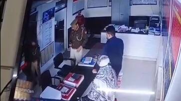 When checking the pistol at a police station of aligarh a shot from the inspector's pistol hit the woman in the head zrua