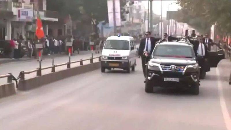 An ambulance passes the PM Modi convoy during the Varanasi roadshow-rag