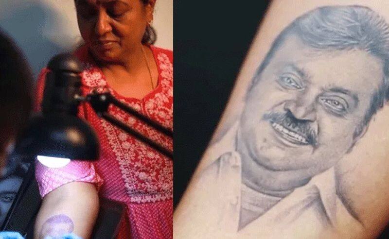 Tamil Actor Vijayakanth wife Premalatha gets husband face tattoo vcs