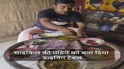 man used bicycle wheel as a dining table video goes viral zkamn