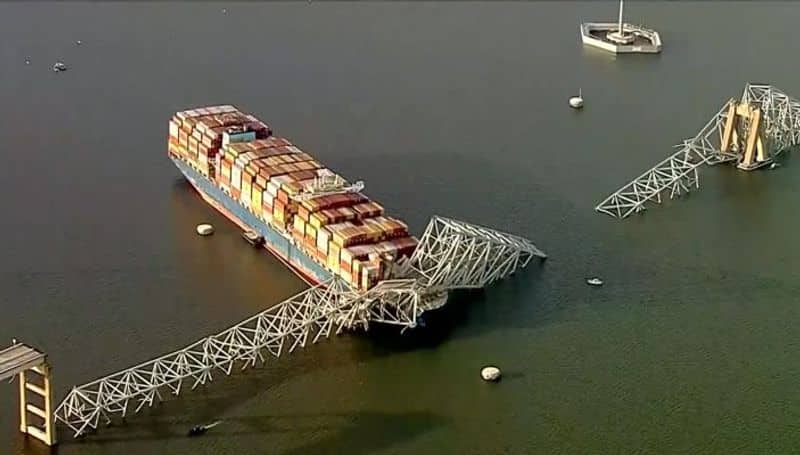 NTSB says cargo ship that crashed into Baltimore bridge carried hazardous materials; 2 bodies recovered