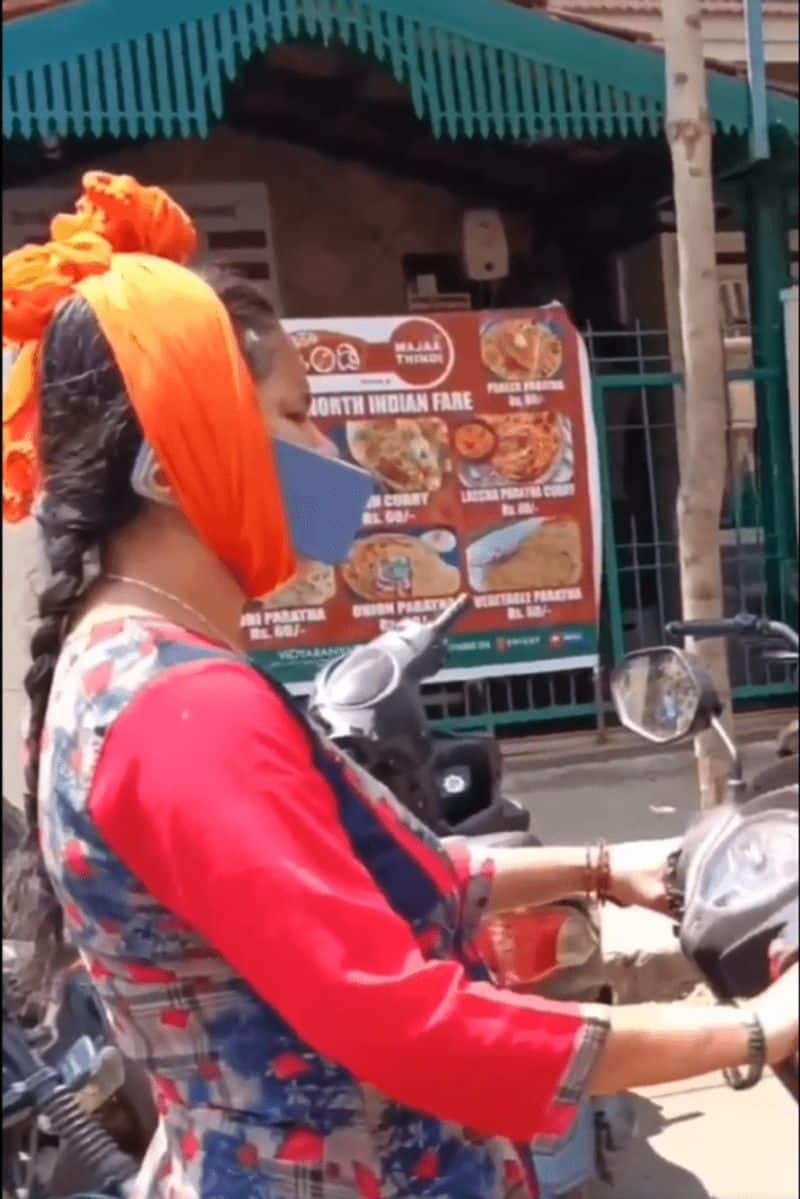 Viral Video: Bengaluru woman's phone 'jugaad' on scooter sparks safety concerns (WATCH)
