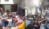Photos of 'ticketless' crowd occupying passengers seats goes viral; Railway seva responds 