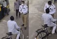 video viral of traffic police try to charge challan on cycle number plate zkamn