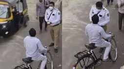 video viral of traffic police try to charge challan on cycle number plate zkamn