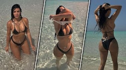 Kim Kardashian BOLD pictures: American model looks HOT in bikini as she takes a dip in the sea RKK