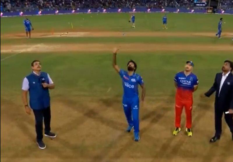 Social Media video claims Toss during MI vs RCB Match Fans react on referee flipped toss coin allegation ckm